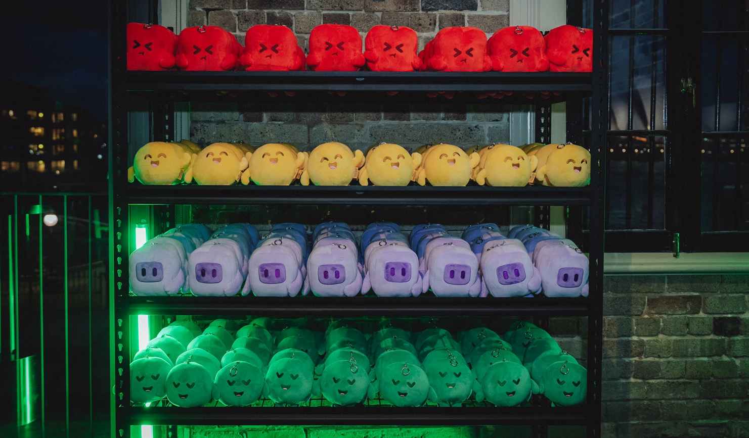 A colorful collection of Buildkite plush build buddies